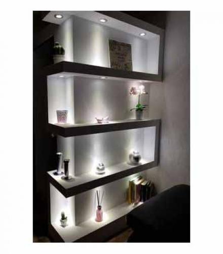 Living room cabinet made of plaster and lighting designed on 2 meters running at a height of 2.70